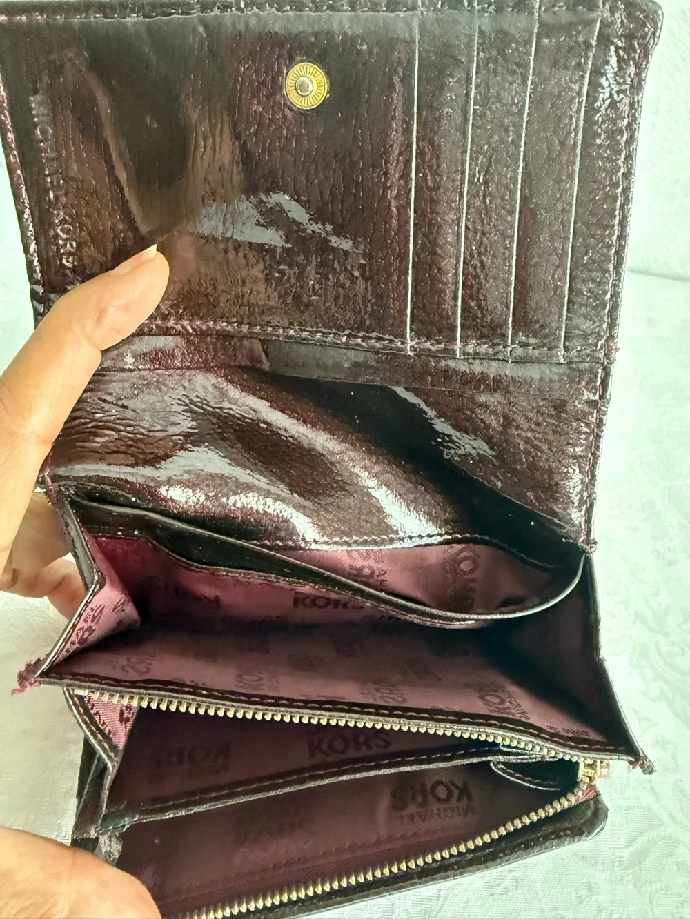 Michael Kors Burgundy patent bifold wallet with Gold Studs